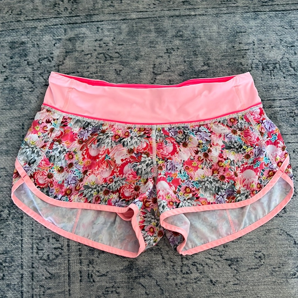 size 6 lululemon running shorts with built in briefs and zip back pocket